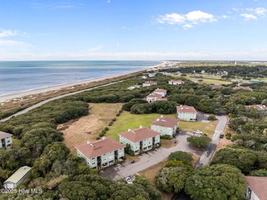 Discover this beautifully renovated, fully furnished end unit on Oak Island Golf Club in North Carolina - for sale on GolfHomes.com, golf home, golf lot