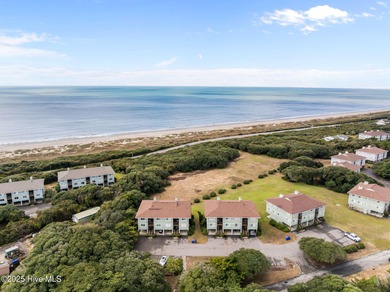 Discover this beautifully renovated, fully furnished end unit on Oak Island Golf Club in North Carolina - for sale on GolfHomes.com, golf home, golf lot