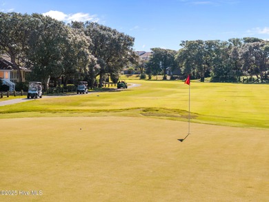 Discover this beautifully renovated, fully furnished end unit on Oak Island Golf Club in North Carolina - for sale on GolfHomes.com, golf home, golf lot