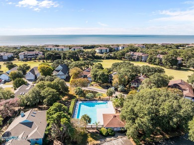 Discover this beautifully renovated, fully furnished end unit on Oak Island Golf Club in North Carolina - for sale on GolfHomes.com, golf home, golf lot