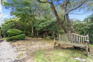 Discover this beautifully renovated, fully furnished end unit on Oak Island Golf Club in North Carolina - for sale on GolfHomes.com, golf home, golf lot