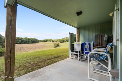 Discover this beautifully renovated, fully furnished end unit on Oak Island Golf Club in North Carolina - for sale on GolfHomes.com, golf home, golf lot