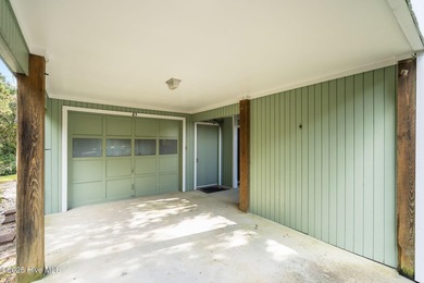 Discover this beautifully renovated, fully furnished end unit on Oak Island Golf Club in North Carolina - for sale on GolfHomes.com, golf home, golf lot