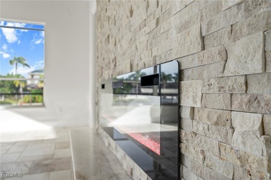 Stunning Full Home Remodel located on an EXTRA WIDE and DEEP on Royal Tee Country Club in Florida - for sale on GolfHomes.com, golf home, golf lot