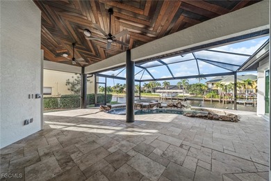 Stunning Full Home Remodel located on an EXTRA WIDE and DEEP on Royal Tee Country Club in Florida - for sale on GolfHomes.com, golf home, golf lot