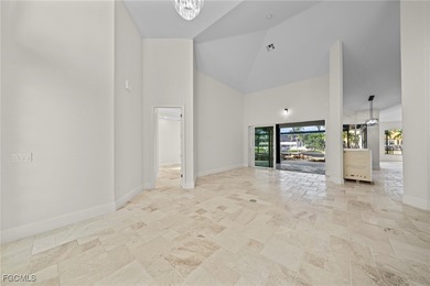 Stunning Full Home Remodel located on an EXTRA WIDE and DEEP on Royal Tee Country Club in Florida - for sale on GolfHomes.com, golf home, golf lot