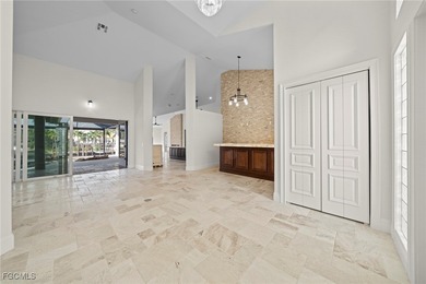 Stunning Full Home Remodel located on an EXTRA WIDE and DEEP on Royal Tee Country Club in Florida - for sale on GolfHomes.com, golf home, golf lot