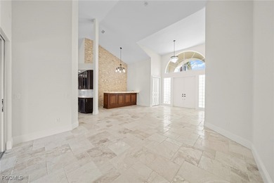 Stunning Full Home Remodel located on an EXTRA WIDE and DEEP on Royal Tee Country Club in Florida - for sale on GolfHomes.com, golf home, golf lot