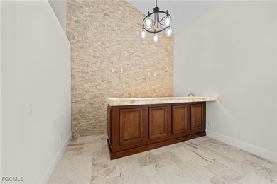 Stunning Full Home Remodel located on an EXTRA WIDE and DEEP on Royal Tee Country Club in Florida - for sale on GolfHomes.com, golf home, golf lot