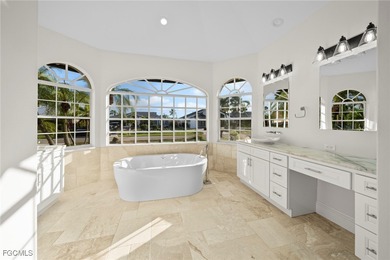 Stunning Full Home Remodel located on an EXTRA WIDE and DEEP on Royal Tee Country Club in Florida - for sale on GolfHomes.com, golf home, golf lot
