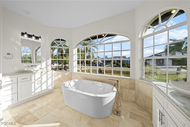 Stunning Full Home Remodel located on an EXTRA WIDE and DEEP on Royal Tee Country Club in Florida - for sale on GolfHomes.com, golf home, golf lot