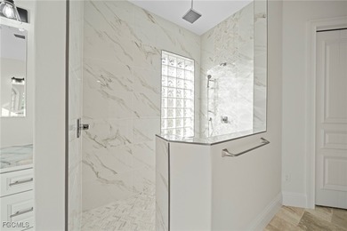 Stunning Full Home Remodel located on an EXTRA WIDE and DEEP on Royal Tee Country Club in Florida - for sale on GolfHomes.com, golf home, golf lot