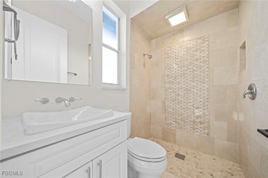 Stunning Full Home Remodel located on an EXTRA WIDE and DEEP on Royal Tee Country Club in Florida - for sale on GolfHomes.com, golf home, golf lot