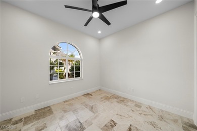 Stunning Full Home Remodel located on an EXTRA WIDE and DEEP on Royal Tee Country Club in Florida - for sale on GolfHomes.com, golf home, golf lot