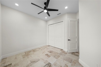 Stunning Full Home Remodel located on an EXTRA WIDE and DEEP on Royal Tee Country Club in Florida - for sale on GolfHomes.com, golf home, golf lot