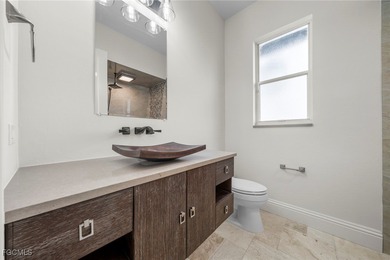 Stunning Full Home Remodel located on an EXTRA WIDE and DEEP on Royal Tee Country Club in Florida - for sale on GolfHomes.com, golf home, golf lot