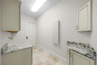 Stunning Full Home Remodel located on an EXTRA WIDE and DEEP on Royal Tee Country Club in Florida - for sale on GolfHomes.com, golf home, golf lot