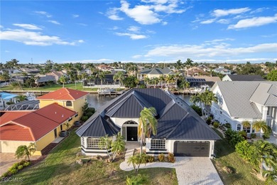 Stunning Full Home Remodel located on an EXTRA WIDE and DEEP on Royal Tee Country Club in Florida - for sale on GolfHomes.com, golf home, golf lot