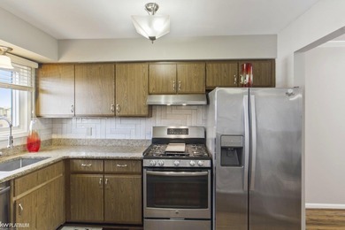 Welcome to an exceptional second-floor residence offering one of on St. Clair Shores Country Club in Michigan - for sale on GolfHomes.com, golf home, golf lot