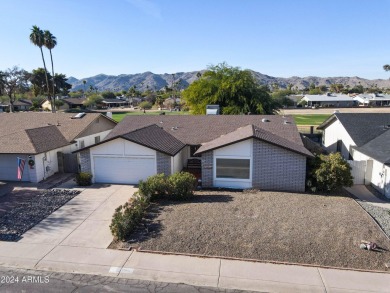 Welcome home to this charming 4-bedroom, 2-bath retreat nestled on Ahwatukee Country Club in Arizona - for sale on GolfHomes.com, golf home, golf lot