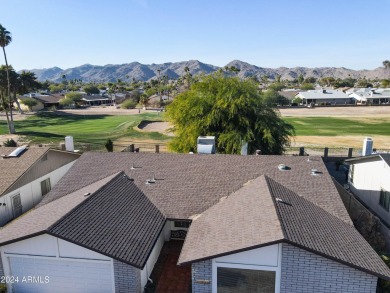 Welcome home to this charming 4-bedroom, 2-bath retreat nestled on Ahwatukee Country Club in Arizona - for sale on GolfHomes.com, golf home, golf lot