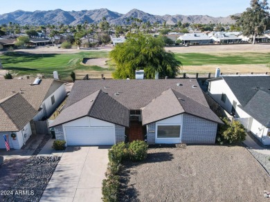 Welcome home to this charming 4-bedroom, 2-bath retreat nestled on Ahwatukee Country Club in Arizona - for sale on GolfHomes.com, golf home, golf lot