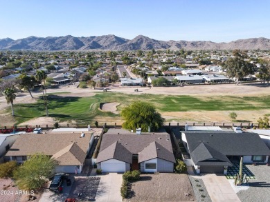 Welcome home to this charming 4-bedroom, 2-bath retreat nestled on Ahwatukee Country Club in Arizona - for sale on GolfHomes.com, golf home, golf lot