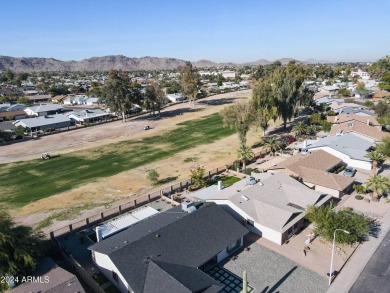 Welcome home to this charming 4-bedroom, 2-bath retreat nestled on Ahwatukee Country Club in Arizona - for sale on GolfHomes.com, golf home, golf lot