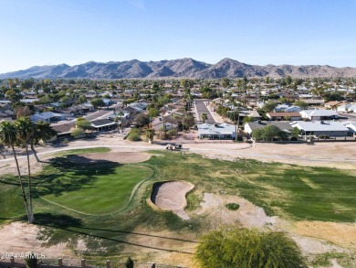 Welcome home to this charming 4-bedroom, 2-bath retreat nestled on Ahwatukee Country Club in Arizona - for sale on GolfHomes.com, golf home, golf lot