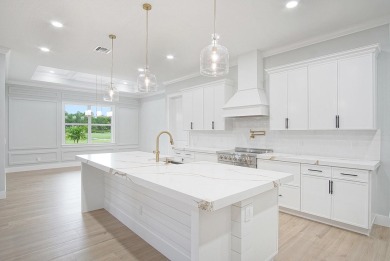 Located on PGA Golf Club's Dye Course, this luxury home has an on The Legacy Golf and Tennis Club in Florida - for sale on GolfHomes.com, golf home, golf lot