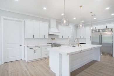 Located on PGA Golf Club's Dye Course, this luxury home has an on The Legacy Golf and Tennis Club in Florida - for sale on GolfHomes.com, golf home, golf lot