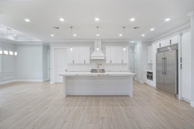 Located on PGA Golf Club's Dye Course, this luxury home has an on The Legacy Golf and Tennis Club in Florida - for sale on GolfHomes.com, golf home, golf lot