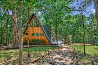 This one of a kind Scandanavian inspired A-frame offers a on Tanglewood Resort in Texas - for sale on GolfHomes.com, golf home, golf lot