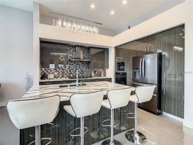 Welcome home to this extraordinary 6 bedroom, 5.5 bathroom on Reunion Resort Golf Course in Florida - for sale on GolfHomes.com, golf home, golf lot