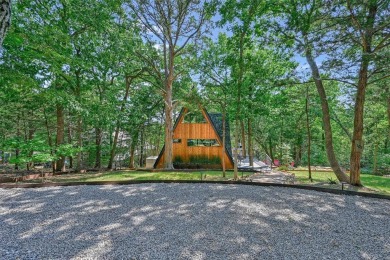 This one of a kind Scandanavian inspired A-frame offers a on Tanglewood Resort in Texas - for sale on GolfHomes.com, golf home, golf lot