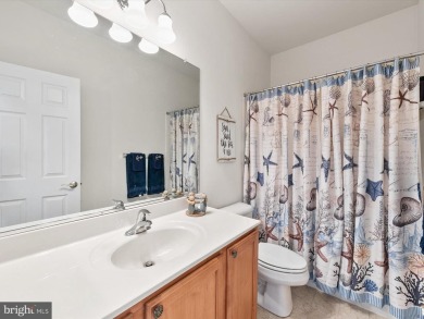 An Exceptional Coastal Retreat - Nestled within the prestigious on Plantation Lakes Golf and Country Club in Delaware - for sale on GolfHomes.com, golf home, golf lot