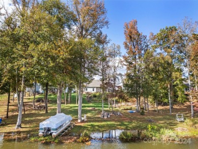 Are you looking for a waterfront home with serene lake and golf on Edgewater Golf Club in South Carolina - for sale on GolfHomes.com, golf home, golf lot