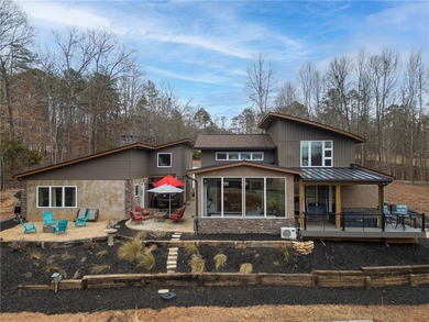 Stunning contemporary home on golf course with panoramic views on The Trail At Chickasaw Pointe in South Carolina - for sale on GolfHomes.com, golf home, golf lot