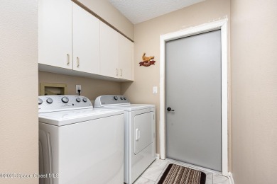 Located in a sought-after resort-style country club community on Indian River Colony Club in Florida - for sale on GolfHomes.com, golf home, golf lot