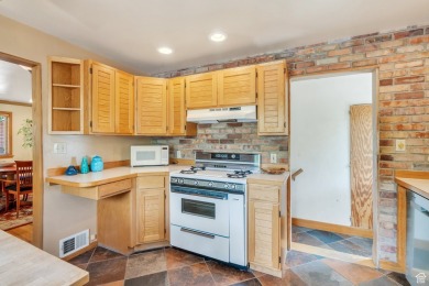 This beautifully maintained historic bungalow with a finished on Forest Dale Golf Club in Utah - for sale on GolfHomes.com, golf home, golf lot