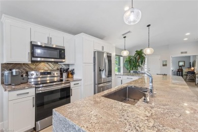 Pool, Golf Course  Water Views ~ Remodeled!
This home truly has on Panther Run Golf Club in Florida - for sale on GolfHomes.com, golf home, golf lot