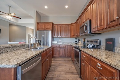 Welcome to this exceptional home in the coveted Redhead Cove on The Oaks Golf Course in Missouri - for sale on GolfHomes.com, golf home, golf lot