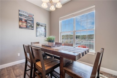 Welcome to this exceptional home in the coveted Redhead Cove on The Oaks Golf Course in Missouri - for sale on GolfHomes.com, golf home, golf lot