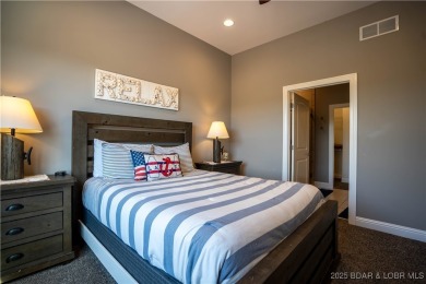 Welcome to this exceptional home in the coveted Redhead Cove on The Oaks Golf Course in Missouri - for sale on GolfHomes.com, golf home, golf lot