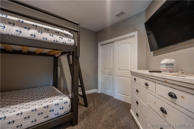 Welcome to this exceptional home in the coveted Redhead Cove on The Oaks Golf Course in Missouri - for sale on GolfHomes.com, golf home, golf lot