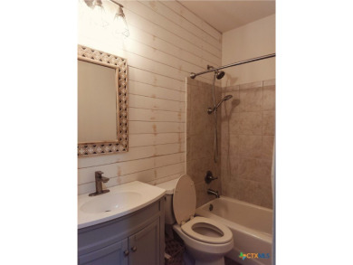 Located off the 14th green of Double Ranch Golf Club with on Quicksand At Woodcreek Golf Club in Texas - for sale on GolfHomes.com, golf home, golf lot