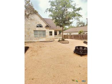 Located off the 14th green of Double Ranch Golf Club with on Quicksand At Woodcreek Golf Club in Texas - for sale on GolfHomes.com, golf home, golf lot