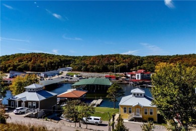 Welcome to this exceptional home in the coveted Redhead Cove on The Oaks Golf Course in Missouri - for sale on GolfHomes.com, golf home, golf lot