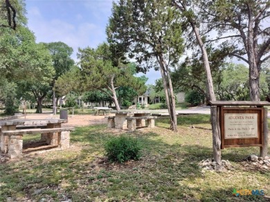 Located off the 14th green of Double Ranch Golf Club with on Quicksand At Woodcreek Golf Club in Texas - for sale on GolfHomes.com, golf home, golf lot