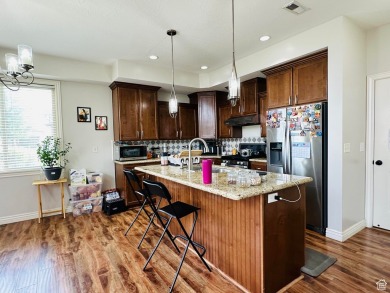 Located in a serene gated community, this beautifully designed on Mulligans Golf and Game in Utah - for sale on GolfHomes.com, golf home, golf lot
